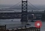 Image of Tugboat on Delaware River and Philadelphia scenes Philadelphia Pennsylvania USA, 1970, second 15 stock footage video 65675040535