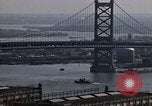Image of Tugboat on Delaware River and Philadelphia scenes Philadelphia Pennsylvania USA, 1970, second 21 stock footage video 65675040535