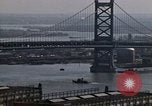Image of Tugboat on Delaware River and Philadelphia scenes Philadelphia Pennsylvania USA, 1970, second 22 stock footage video 65675040535