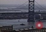 Image of Tugboat on Delaware River and Philadelphia scenes Philadelphia Pennsylvania USA, 1970, second 25 stock footage video 65675040535