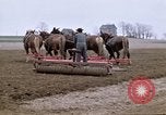 Image of Farmer with horses and mules plows field New York United States USA, 1970, second 6 stock footage video 65675040536