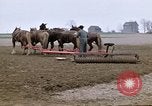 Image of Farmer with horses and mules plows field New York United States USA, 1970, second 8 stock footage video 65675040536