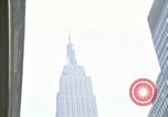 Image of Empire State Building and New York State Supreme Courthouse New York City USA, 1970, second 1 stock footage video 65675040538