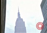 Image of Empire State Building and New York State Supreme Courthouse New York City USA, 1970, second 4 stock footage video 65675040538