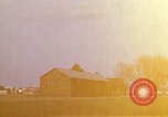 Image of Suburban houses near farm New York United States USA, 1970, second 1 stock footage video 65675040542