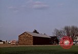 Image of Suburban houses near farm New York United States USA, 1970, second 3 stock footage video 65675040542
