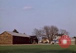 Image of Suburban houses near farm New York United States USA, 1970, second 11 stock footage video 65675040542