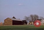 Image of Suburban houses near farm New York United States USA, 1970, second 12 stock footage video 65675040542