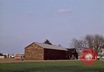 Image of Suburban houses near farm New York United States USA, 1970, second 13 stock footage video 65675040542