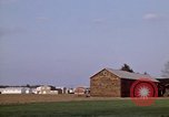 Image of Suburban houses near farm New York United States USA, 1970, second 15 stock footage video 65675040542