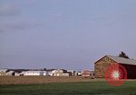 Image of Suburban houses near farm New York United States USA, 1970, second 16 stock footage video 65675040542