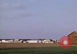 Image of Suburban houses near farm New York United States USA, 1970, second 17 stock footage video 65675040542
