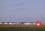 Image of Suburban houses near farm New York United States USA, 1970, second 18 stock footage video 65675040542
