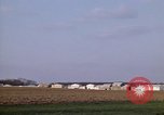 Image of Suburban houses near farm New York United States USA, 1970, second 20 stock footage video 65675040542