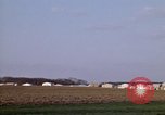 Image of Suburban houses near farm New York United States USA, 1970, second 22 stock footage video 65675040542