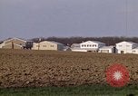 Image of Suburban houses near farm New York United States USA, 1970, second 26 stock footage video 65675040542