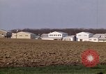 Image of Suburban houses near farm New York United States USA, 1970, second 28 stock footage video 65675040542