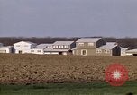 Image of Suburban houses near farm New York United States USA, 1970, second 31 stock footage video 65675040542
