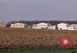 Image of Suburban houses near farm New York United States USA, 1970, second 37 stock footage video 65675040542