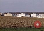 Image of Suburban houses near farm New York United States USA, 1970, second 38 stock footage video 65675040542