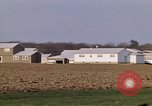 Image of Suburban houses near farm New York United States USA, 1970, second 43 stock footage video 65675040542