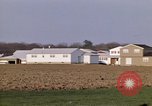 Image of Suburban houses near farm New York United States USA, 1970, second 44 stock footage video 65675040542