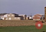 Image of Suburban houses near farm New York United States USA, 1970, second 46 stock footage video 65675040542