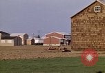 Image of Suburban houses near farm New York United States USA, 1970, second 47 stock footage video 65675040542