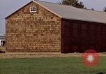 Image of Suburban houses near farm New York United States USA, 1970, second 49 stock footage video 65675040542