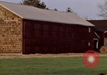 Image of Suburban houses near farm New York United States USA, 1970, second 50 stock footage video 65675040542
