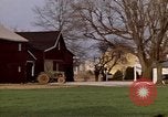 Image of Suburban houses near farm New York United States USA, 1970, second 52 stock footage video 65675040542