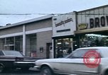 Image of Shops and stores along street of New York City New York City USA, 1970, second 1 stock footage video 65675040546