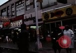 Image of Shops and stores along street of New York City New York City USA, 1970, second 12 stock footage video 65675040546