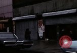 Image of Shops and stores along street of New York City New York City USA, 1970, second 19 stock footage video 65675040546