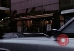 Image of Shops and stores along street of New York City New York City USA, 1970, second 21 stock footage video 65675040546