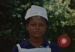 Image infirmière jamaïcaine Jamaïque, 1972, de la seconde 9 séquences d'archives historiques vidéo 65675040561