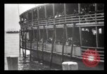 Immagine di Gli immigrati che arrivano ad Ellis Island New York City USA, 1903, secondo 33 filmato di repertorio 65675040610