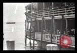 Immagine di Gli immigrati che arrivano ad Ellis Island New York City USA, 1903, secondo 48 filmato di repertorio 65675040610