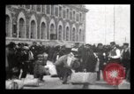 Image of Immigrants arriving at Ellis Island New York City USA, 1906, second 10 stock footage video 65675040611