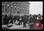 Image of Immigrants arriving at Ellis Island New York City USA, 1906, second 33 stock footage video 65675040611