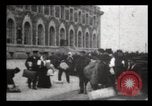 Image of Immigrants arriving at Ellis Island New York City USA, 1906, second 39 stock footage video 65675040611