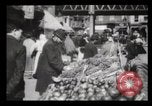 Image of Pushcart vendors New York City USA, 1903, second 5 stock footage video 65675040618
