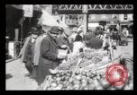 Image of Pushcart vendors New York City USA, 1903, second 15 stock footage video 65675040618