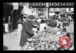 Image of Pushcart vendors New York City USA, 1903, second 18 stock footage video 65675040618