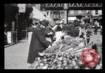 Image of Pushcart vendors New York City USA, 1903, second 20 stock footage video 65675040618