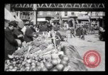 Image of Pushcart vendors New York City USA, 1903, second 27 stock footage video 65675040618
