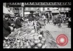 Image of Pushcart vendors New York City USA, 1903, second 28 stock footage video 65675040618