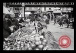 Image of Pushcart vendors New York City USA, 1903, second 29 stock footage video 65675040618