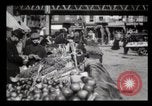 Image of Pushcart vendors New York City USA, 1903, second 31 stock footage video 65675040618