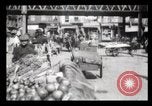 Image of Pushcart vendors New York City USA, 1903, second 36 stock footage video 65675040618